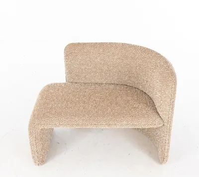 Fauteuil NOVA, profil latéral révélant la silhouette architecturale
