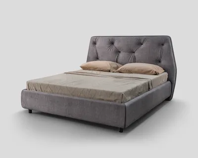 ORIAN bed, front corner view with button-tufted headboard on a neutral background