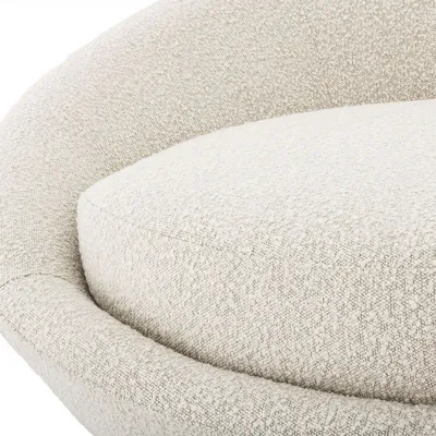 Fauteuil AURA, détail rapproché de l'assise et du revêtement bouclé texturé