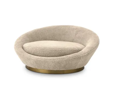 Fauteuil AURA, vue de face en studio sur fond neutre montrant la forme circulaire