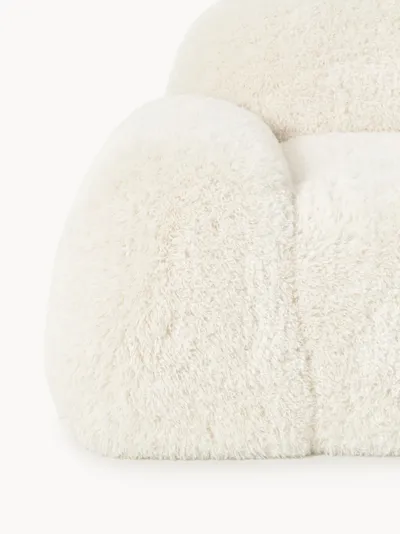 Fauteuil LINN, détail de l'accoudoir en tissu bouclé