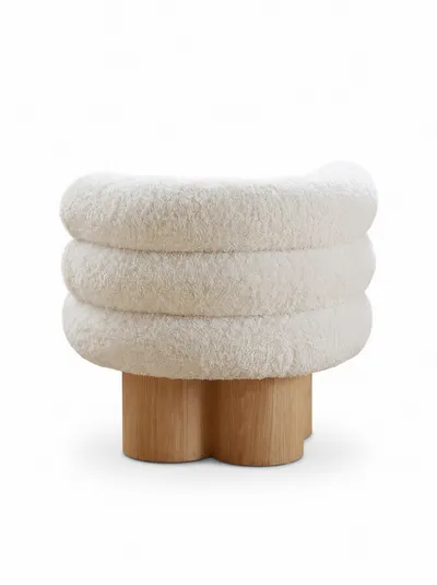 Fauteuil OTTO en bouclé crème, vue frontale mettant en évidence les volumes circulaires superposés
