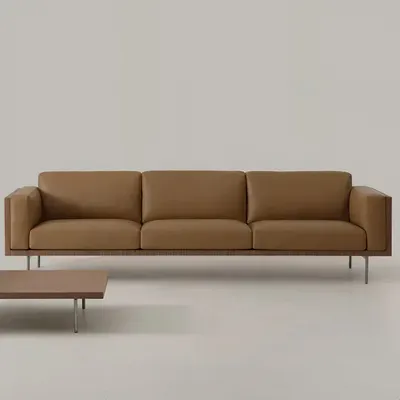 Sofa RYDEN, skulpturale Vorderansicht mit sichtbarer Holzseite