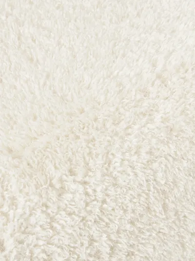 Fauteuil LINN, détail rapproché du revêtement en bouclé