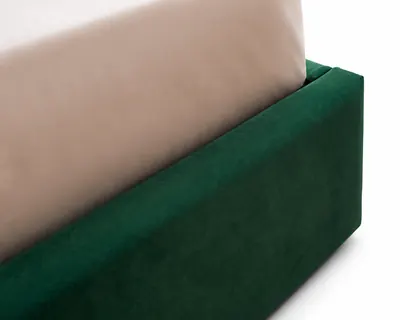 Détail de l'angle de la base rembourrée du lit LORIS